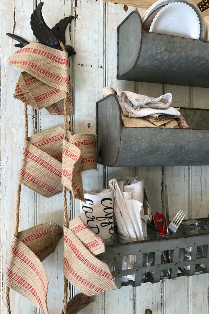 How to Make a Burlap Garland | This DIY tutorial is so farmhouse adorable, and so easy to sew! Perfect for rustic DIY decor for the home, this fixer upper style banner is right at home in a kitchen or for Valentine's Day
