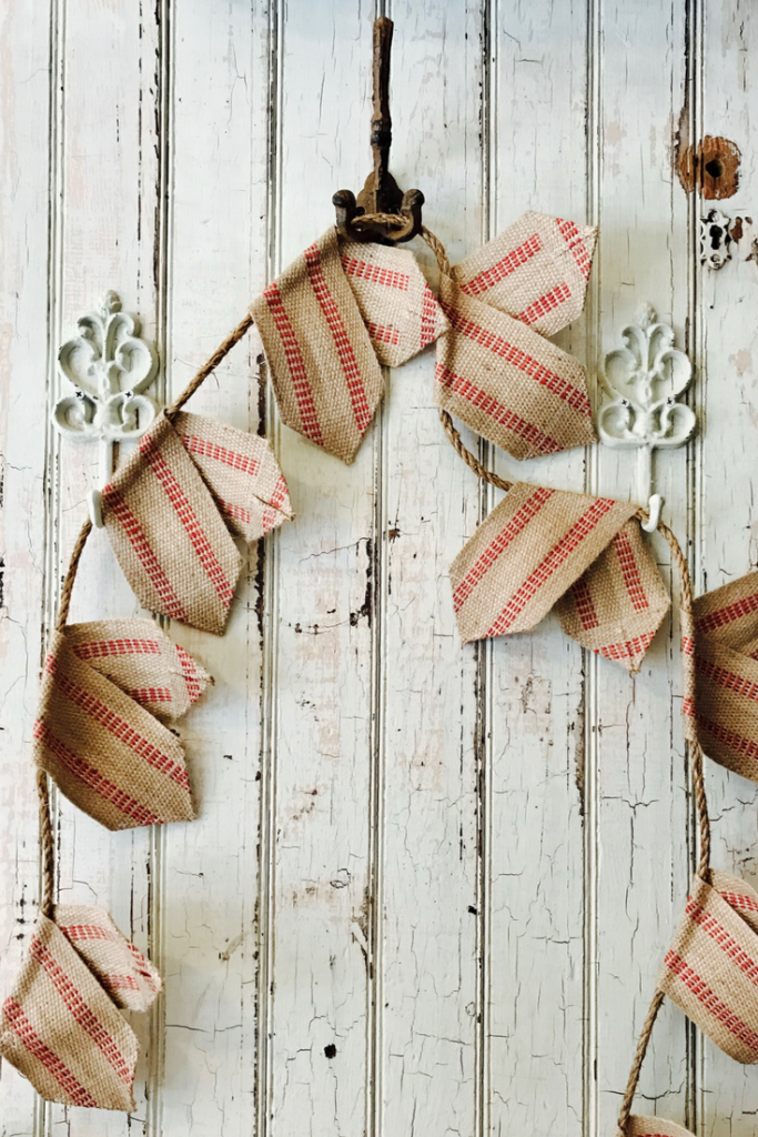 How to Make a Burlap Garland | This DIY tutorial is so farmhouse adorable, and so easy to sew! Perfect for rustic DIY decor for the home, this fixer upper style banner is right at home in a kitchen or for Valentine's Day